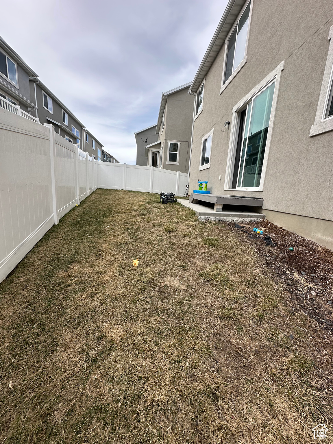 View of yard featuring a fenced backyard