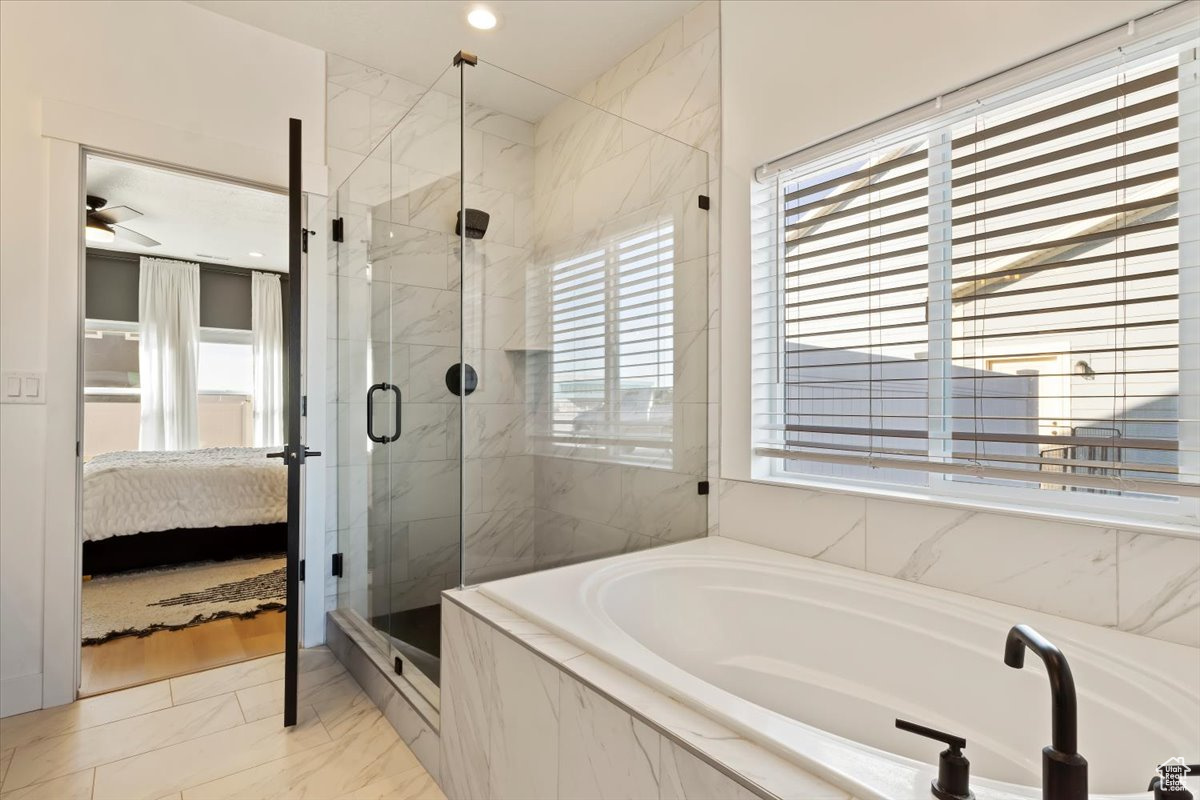 Full bath with a garden tub, marble finish floor, ensuite bathroom, a marble finish shower, and ceiling fan