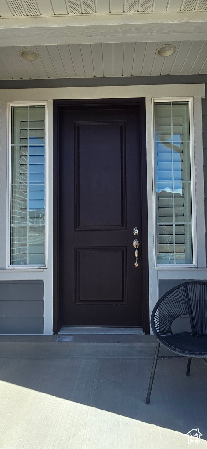Property entrance featuring a porch