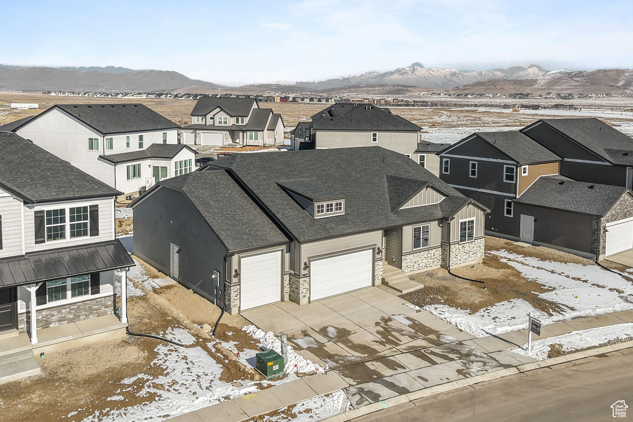 Drone / aerial view with a residential view and a mountain view