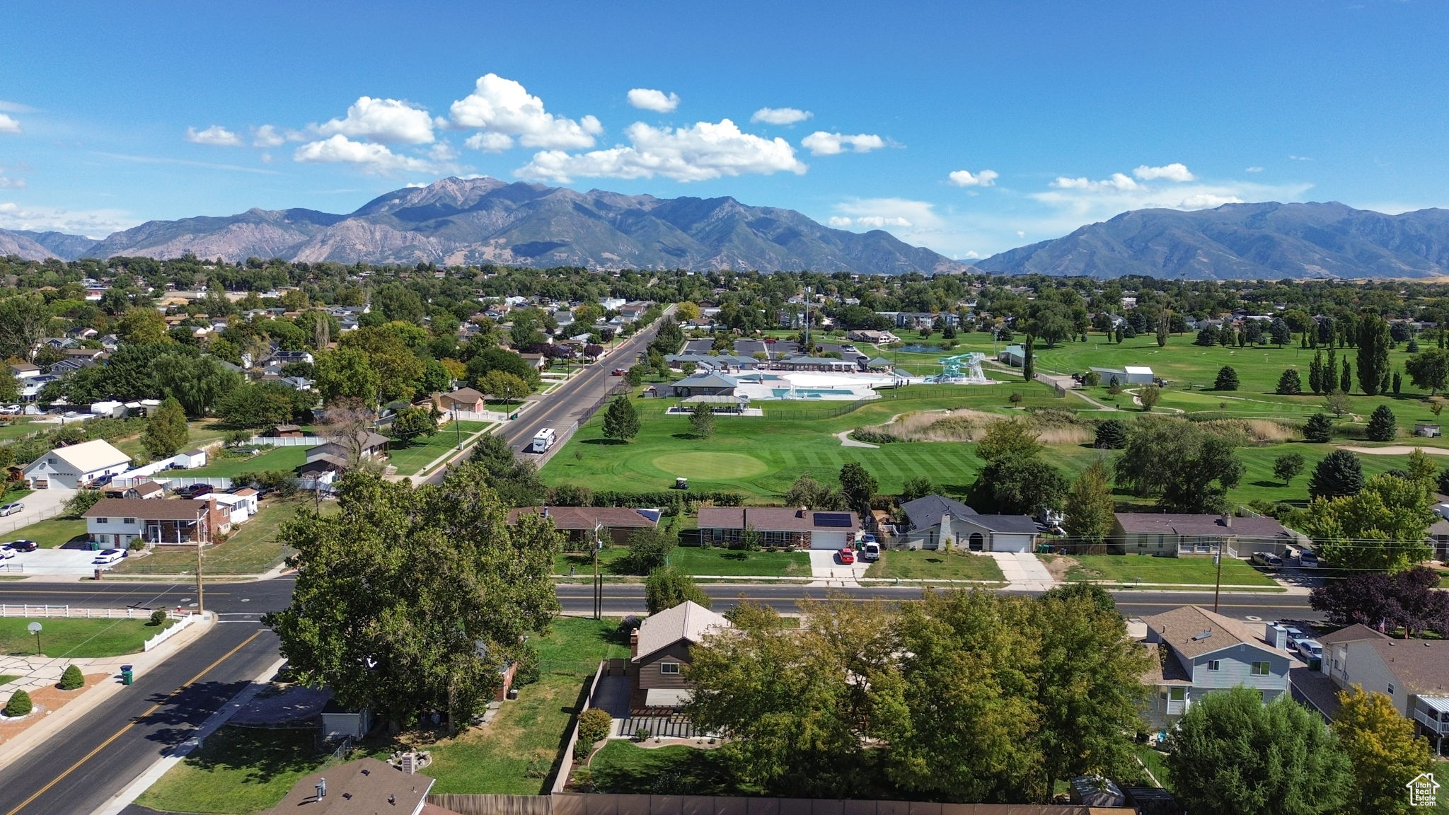 Aerial view featuring a mountain view and a residential view