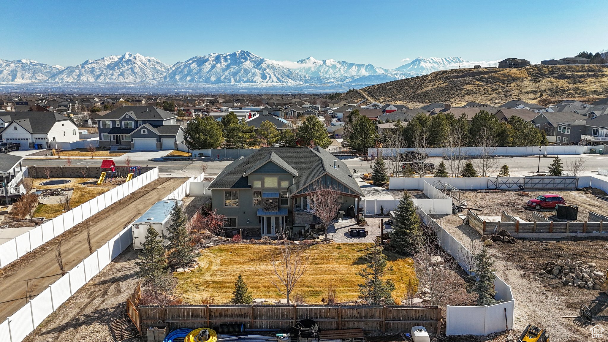 Drone / aerial view with a residential view and a mountain view