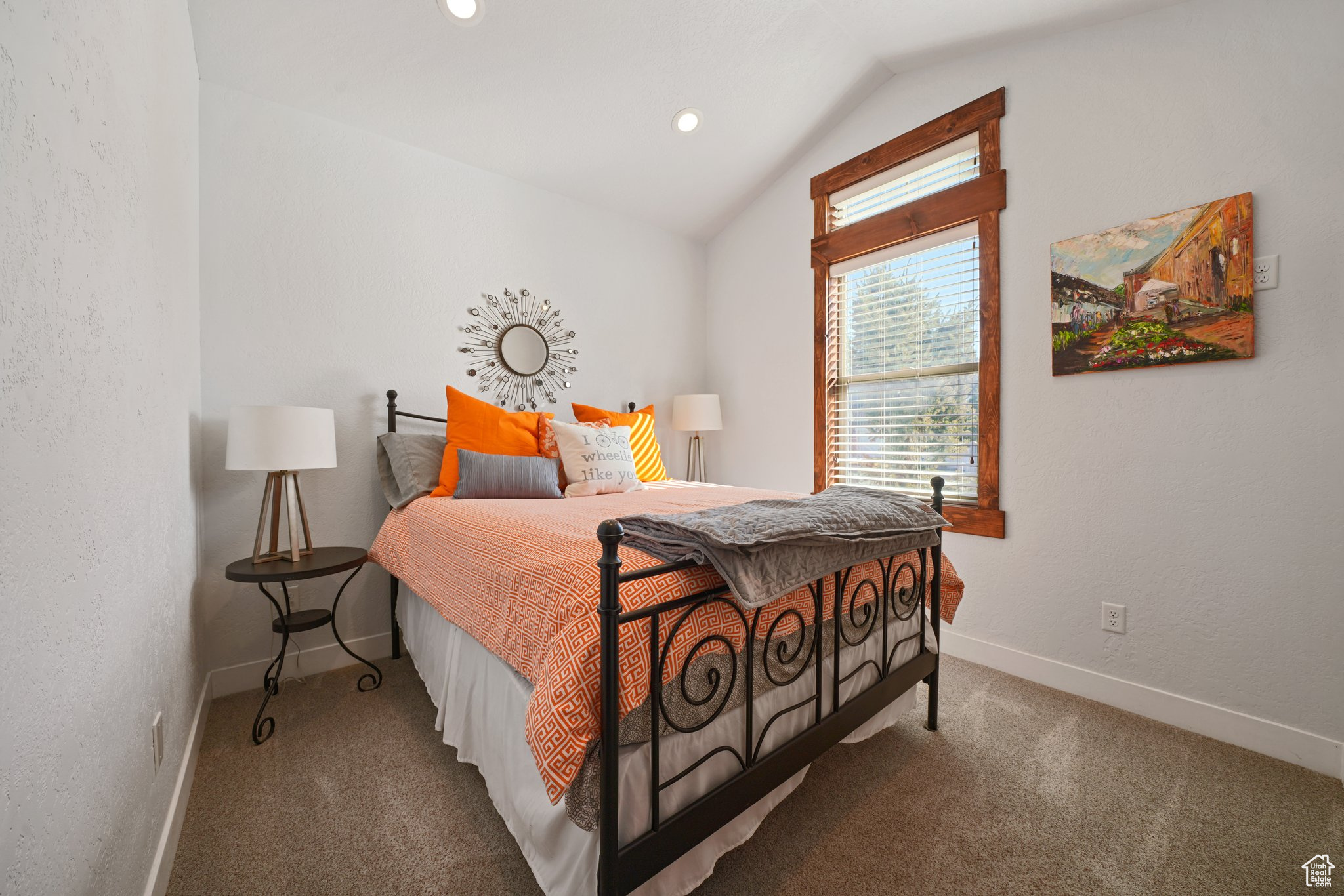 Carpeted bedroom featuring vaulted ceiling, recessed lighting, and baseboards