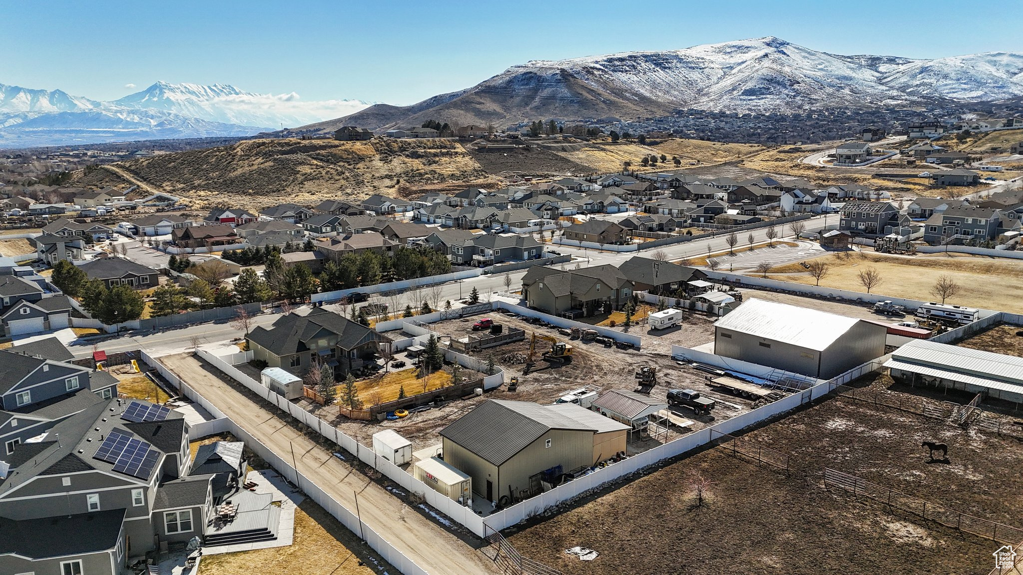 Aerial view featuring a mountain view and a residential view