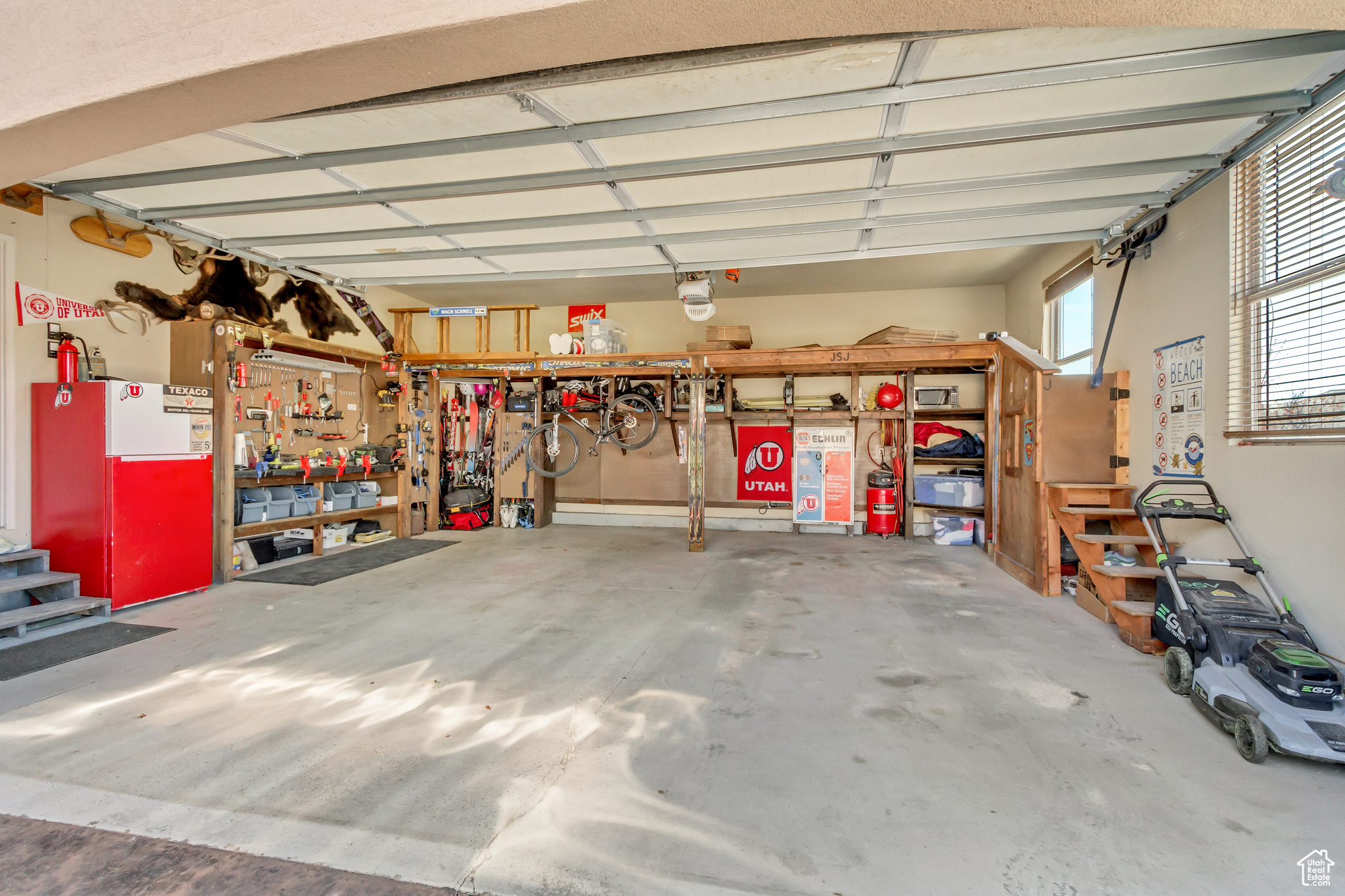 Spacious Garage featuring a workshop area