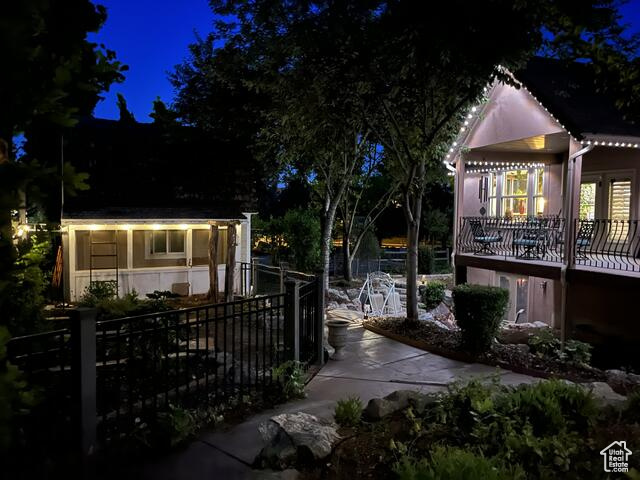 View of backyard with shed / garden area / back covered porch