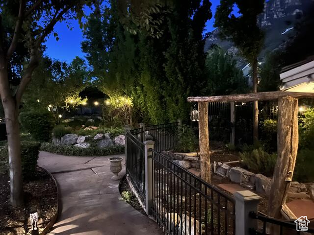 Huge backyard with concrete pathways