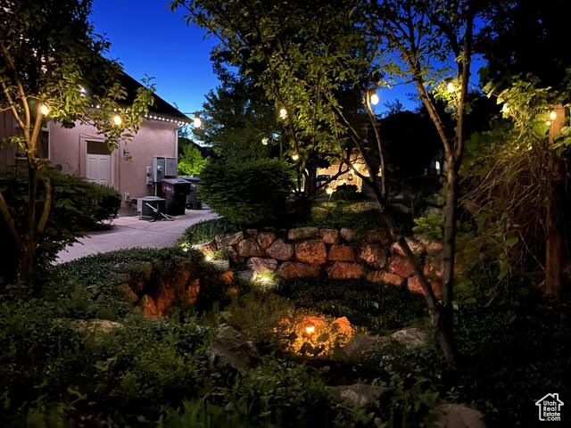 View of yard with fire pit area