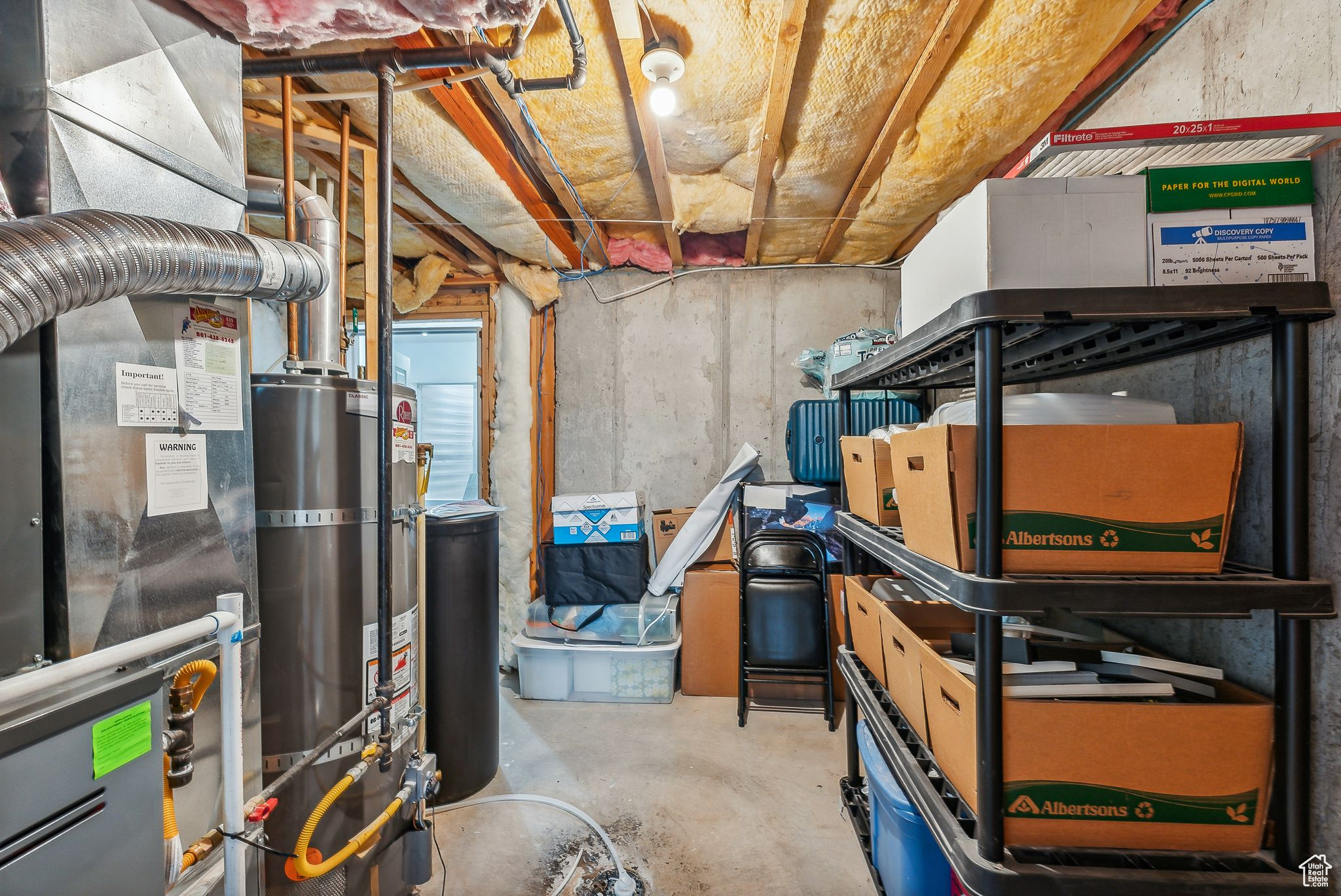 Unfinished below grade area with secured water heater