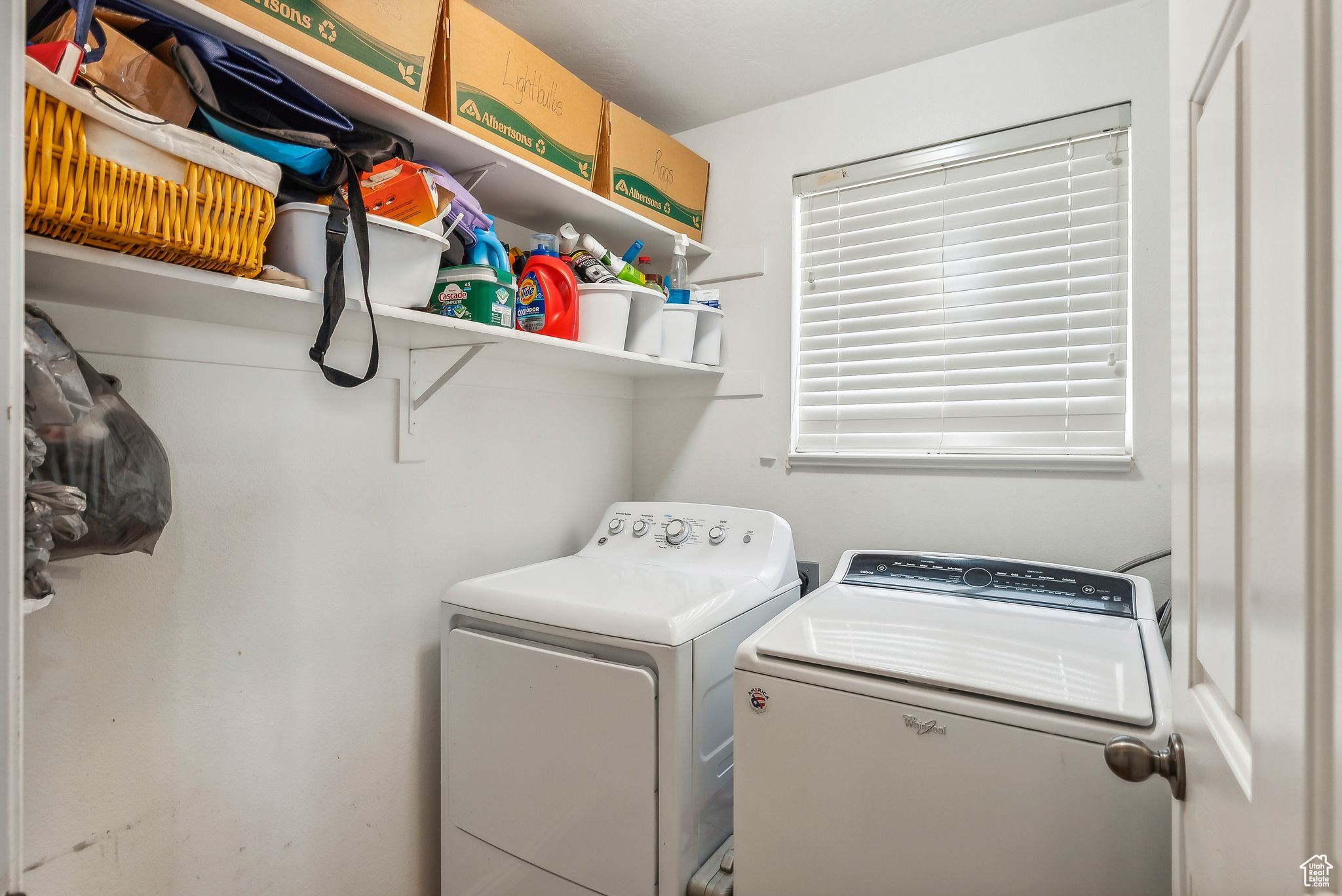 Washroom with laundry area and independent washer and dryer