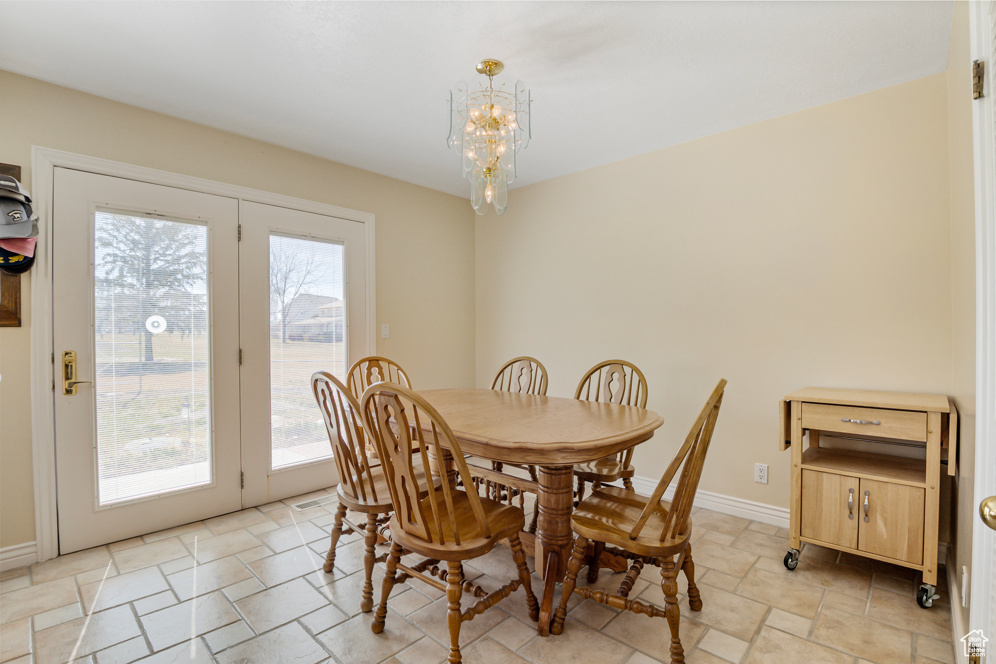 Kitchen Dining space with french doors to patio on golf course