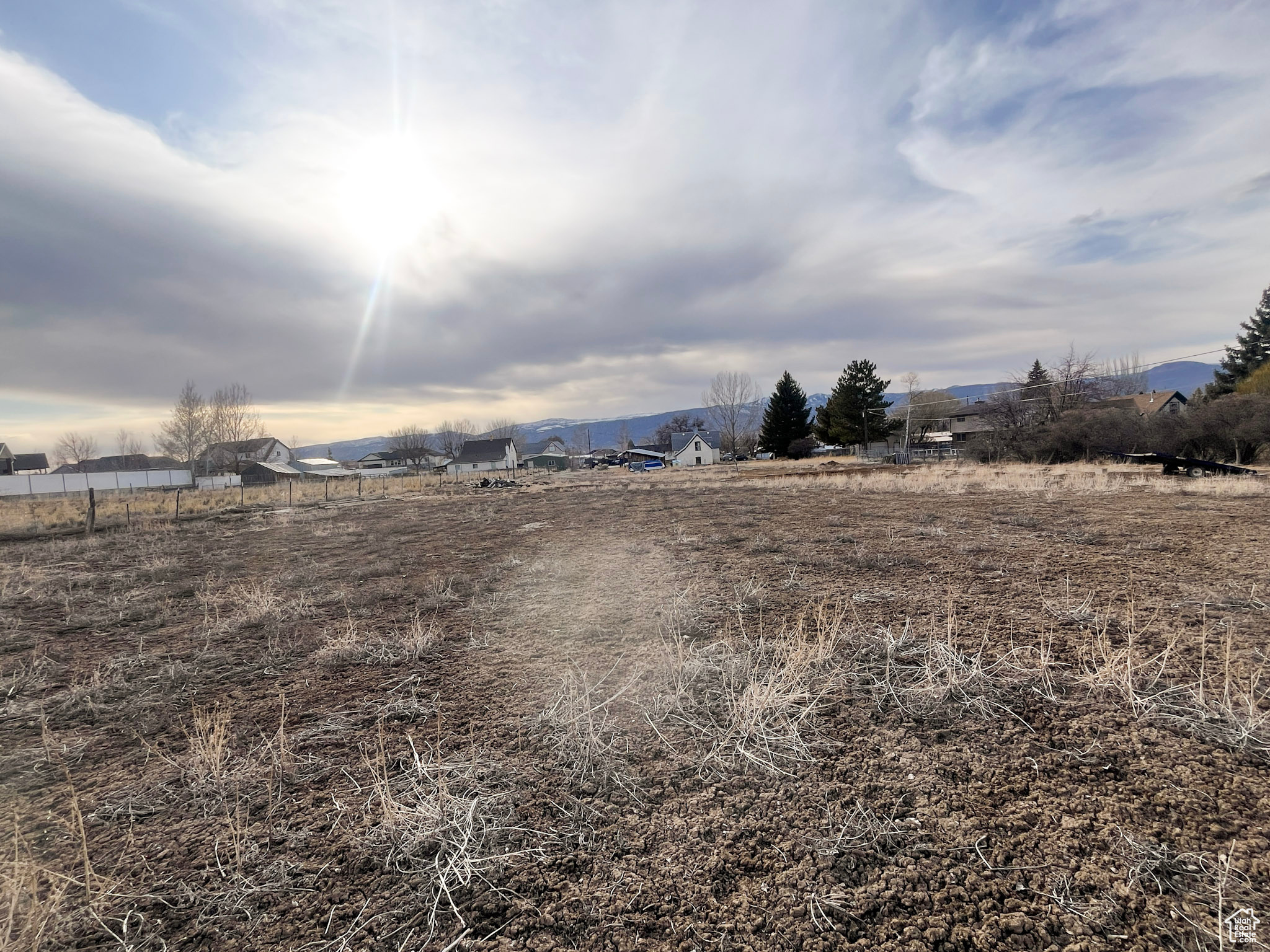 View of yard with a rural view