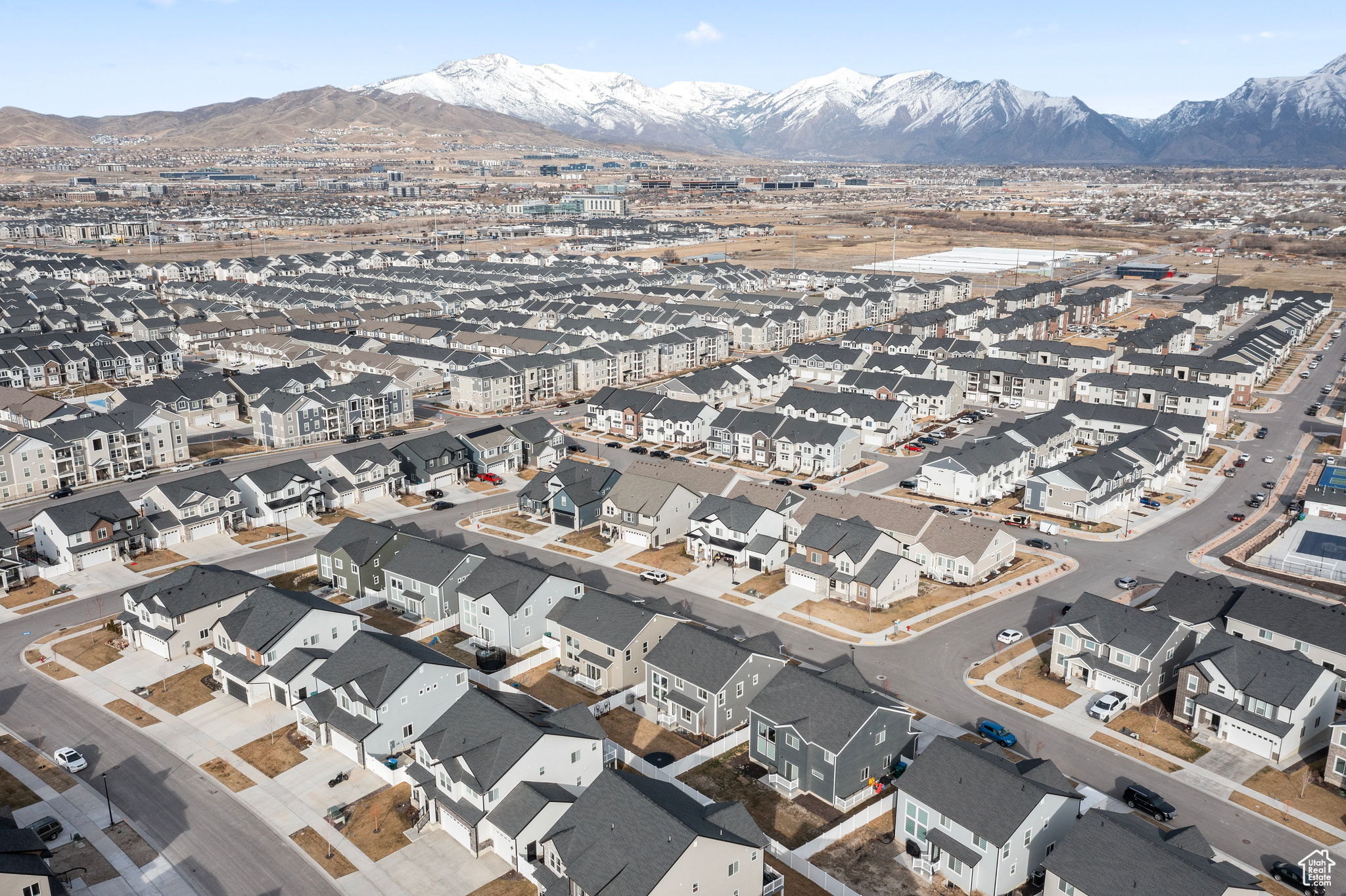Birds eye view of property with a residential view and a mountain view