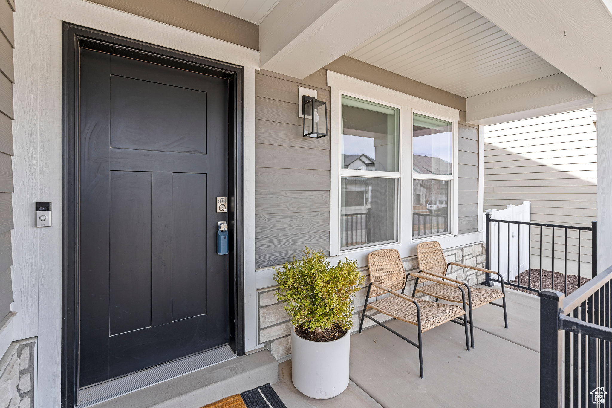 Property entrance with covered porch