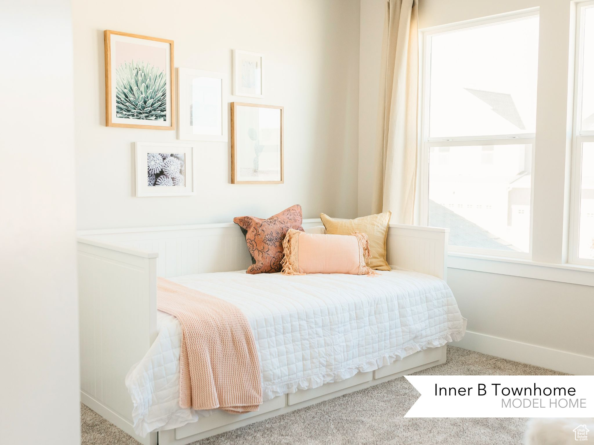 Bedroom featuring carpet flooring and baseboards