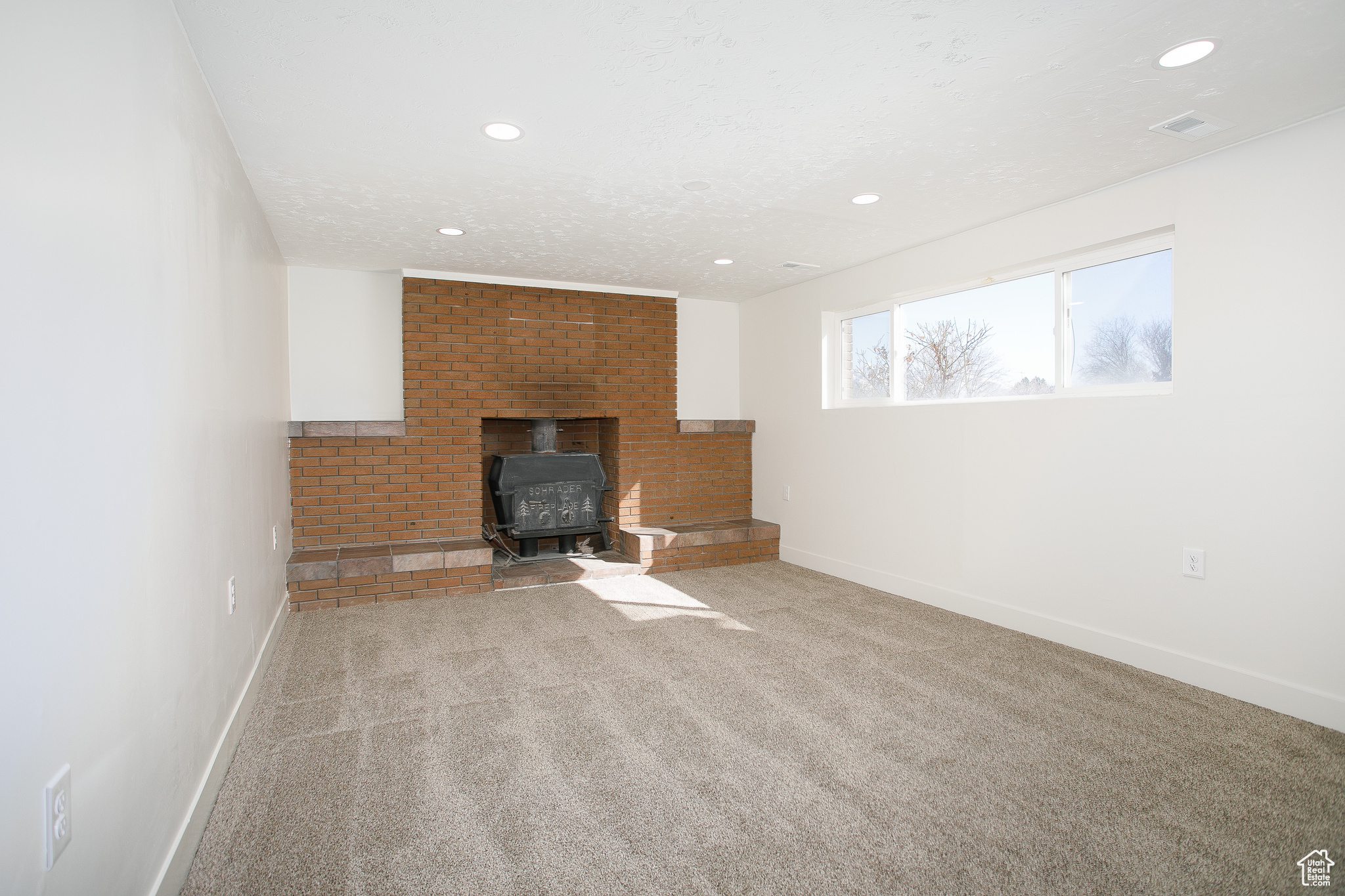 Beautiful living room with brick fireplace