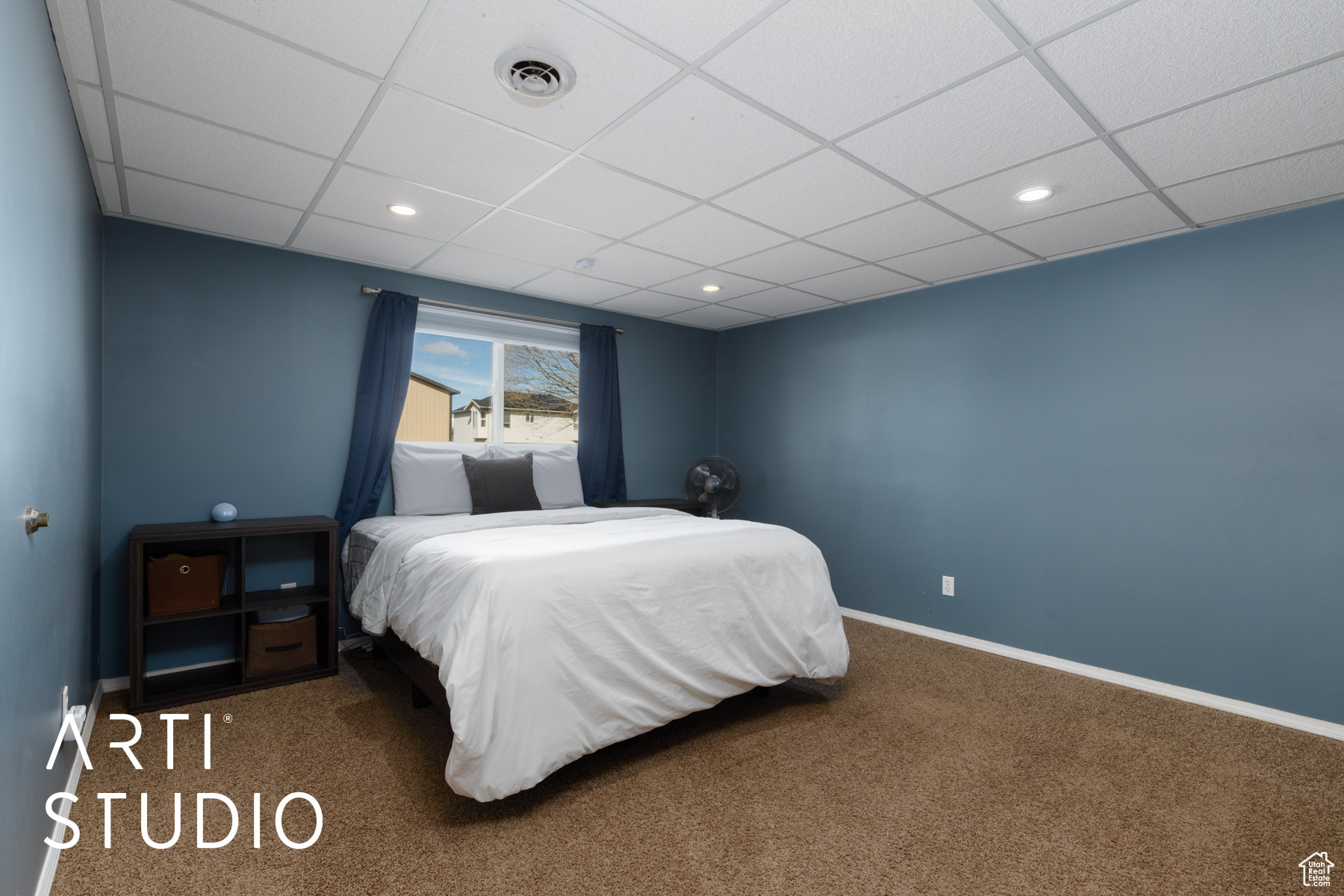Carpeted bedroom with recessed lighting, baseboards, visible vents, and a drop ceiling