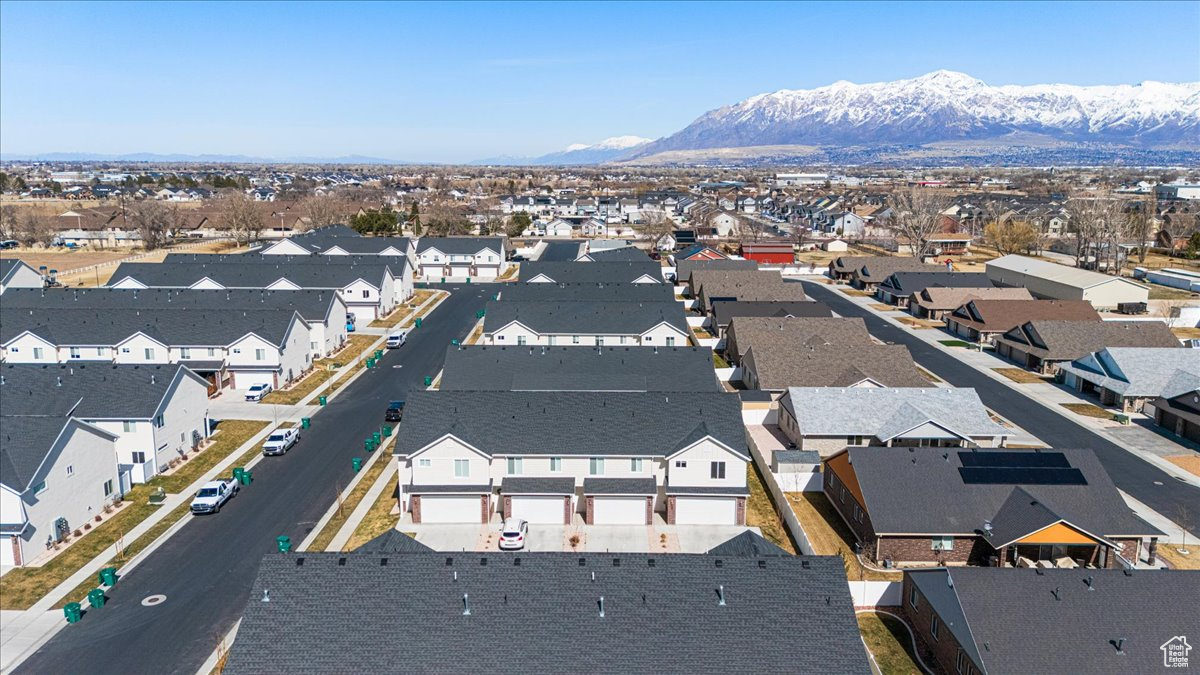 Drone / aerial view featuring a residential view and a mountain view