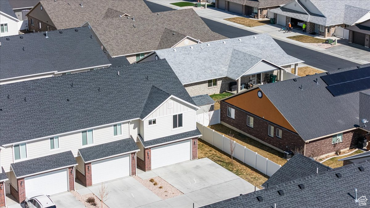 Birds eye view of property with a residential view