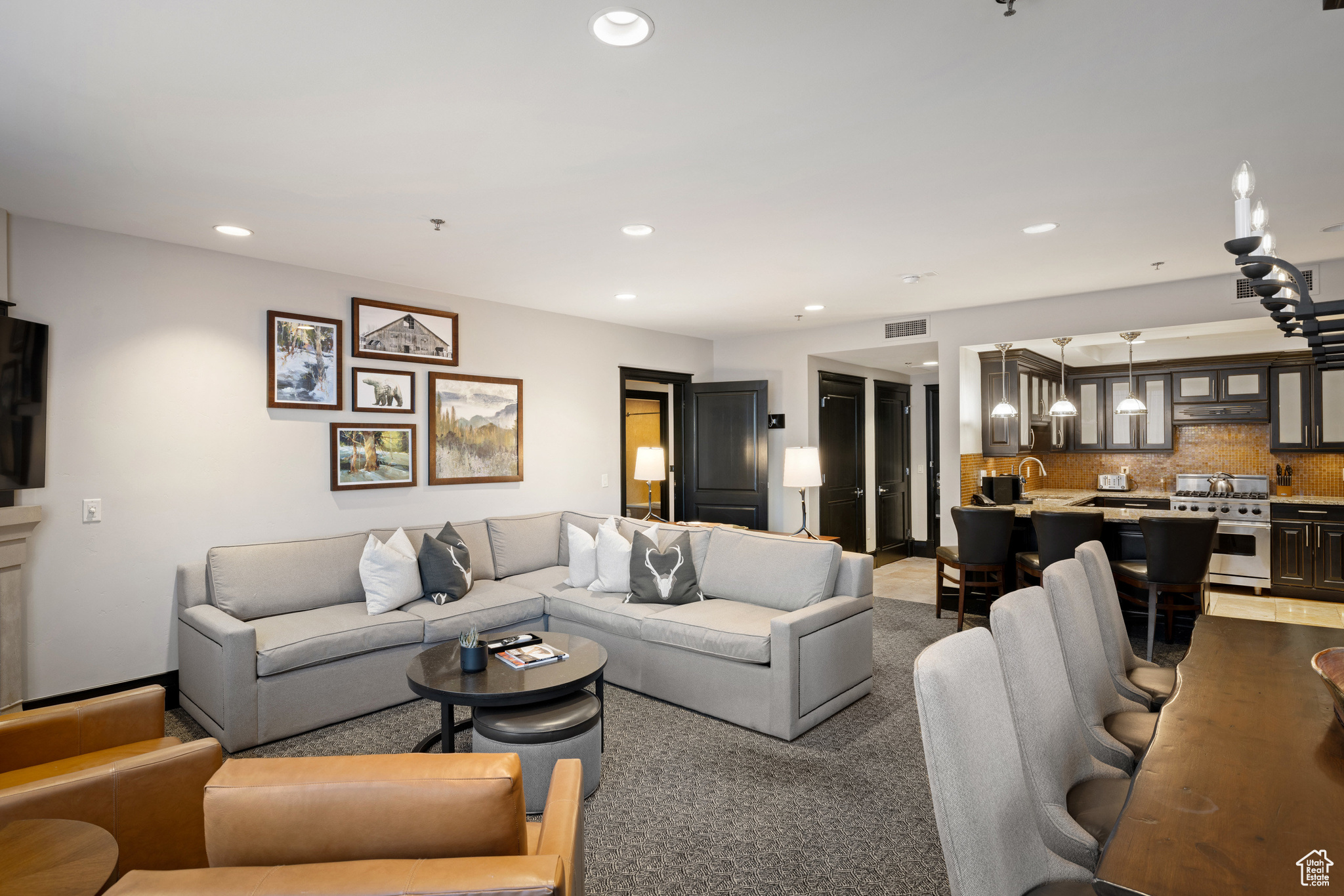 Living room with visible vents and recessed lighting