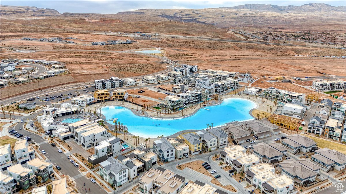 Birds eye view of property featuring a mountain view