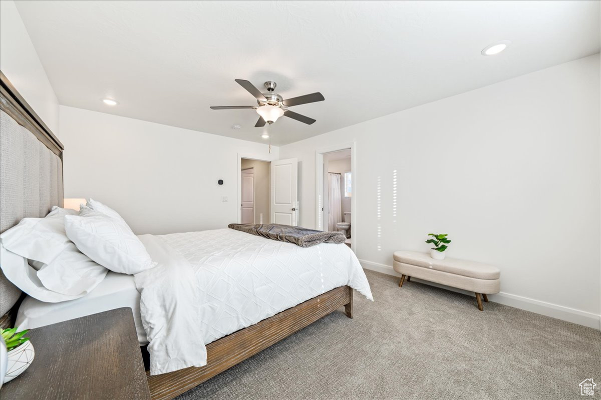 Bedroom with recessed lighting, carpet flooring, ceiling fan, and baseboards