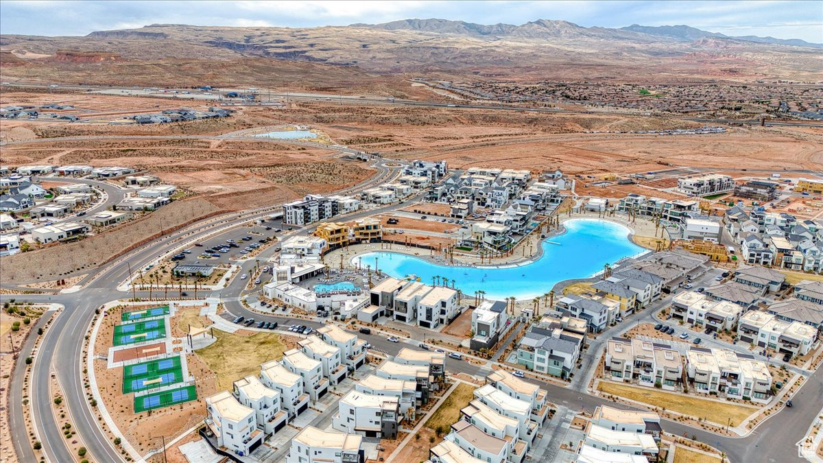 Birds eye view of property with a mountain view