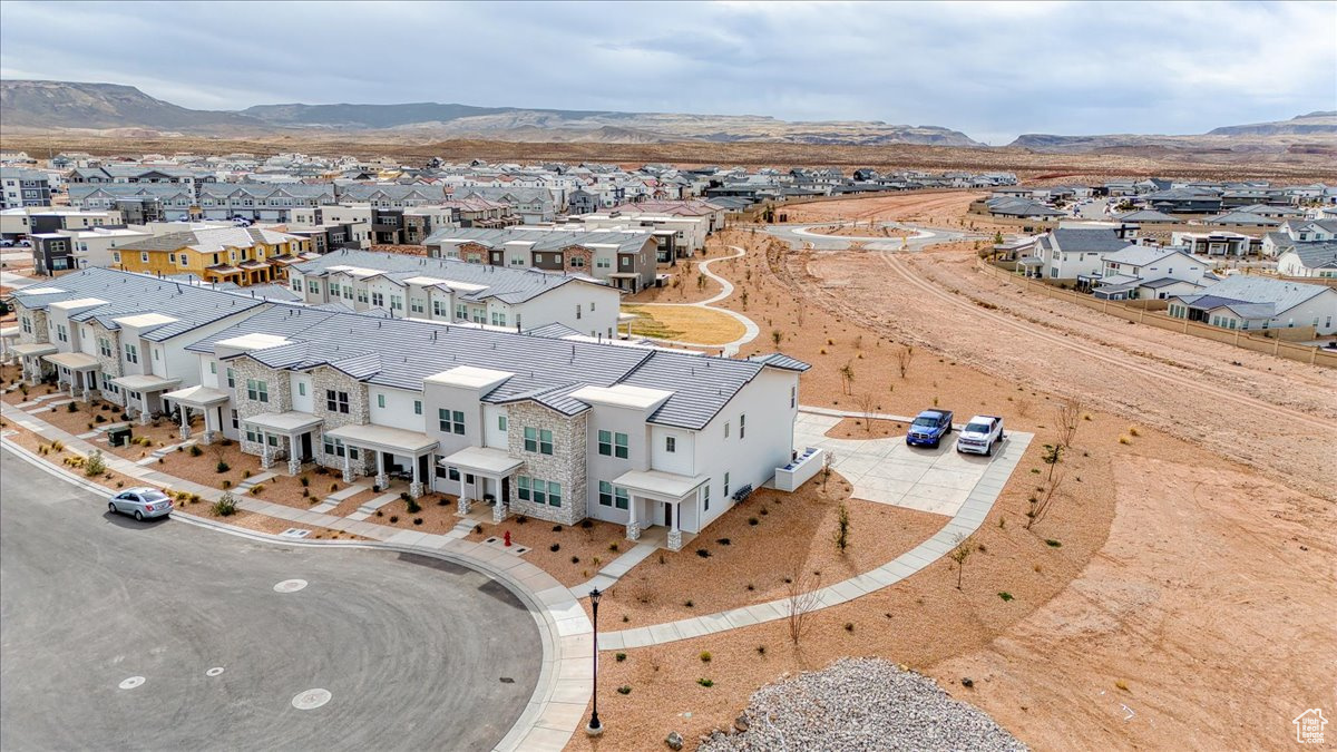 Aerial view featuring a residential view and a mountain view
