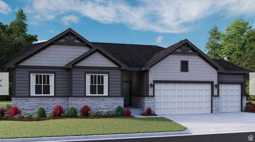 Craftsman inspired home featuring stone siding, an attached garage, driveway, and a front lawn