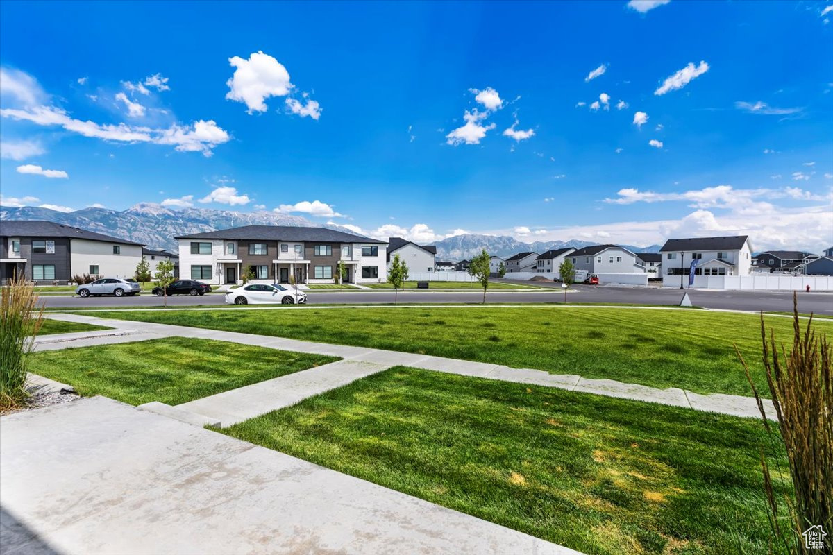 View of yard featuring a mountain view and a residential view