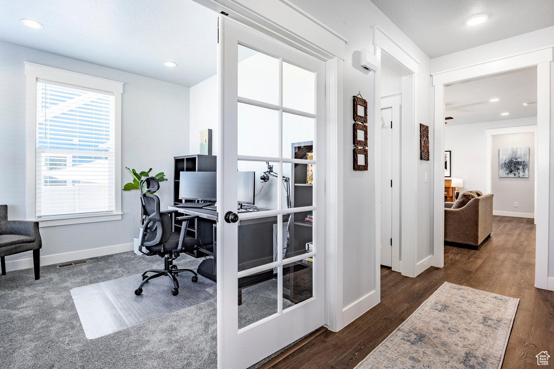 Office space featuring recessed lighting, baseboards, and wood finished floors