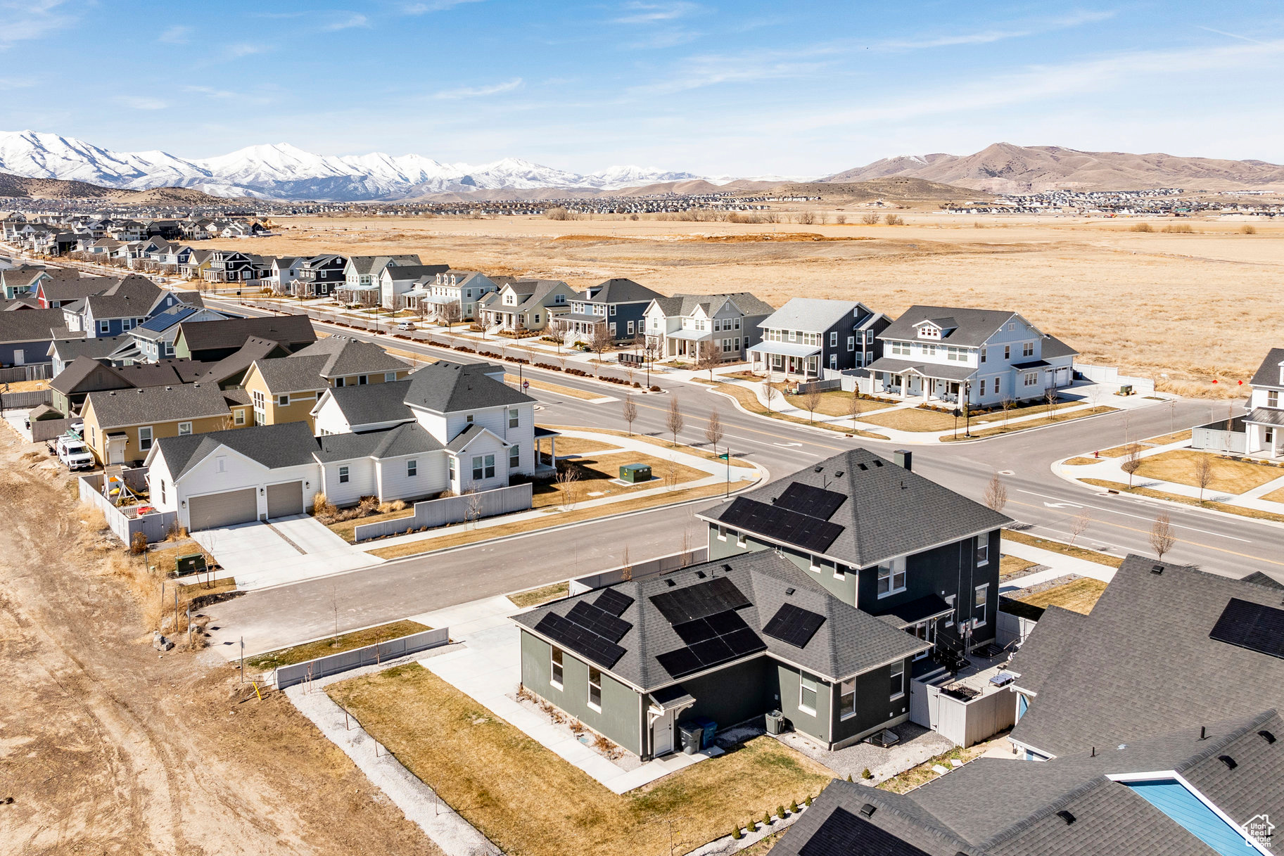 Drone / aerial view with a residential view and a mountain view