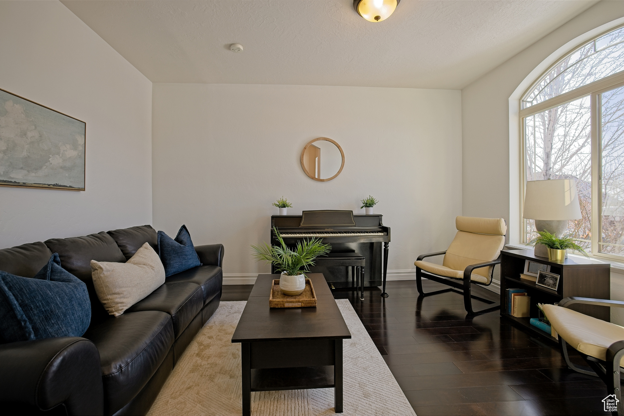 Living room featuring plenty of natural light and hardwood floors