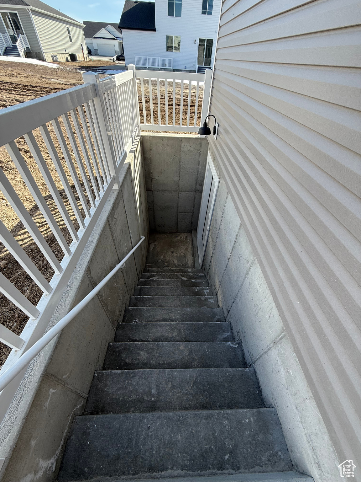 View of basement entrance stairs