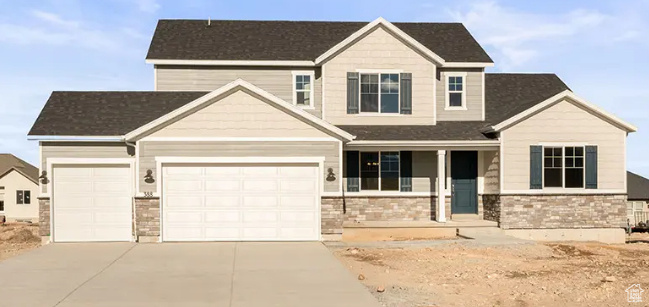 Craftsman inspired home with an attached garage and driveway - Not exact home but the same exterior elevation