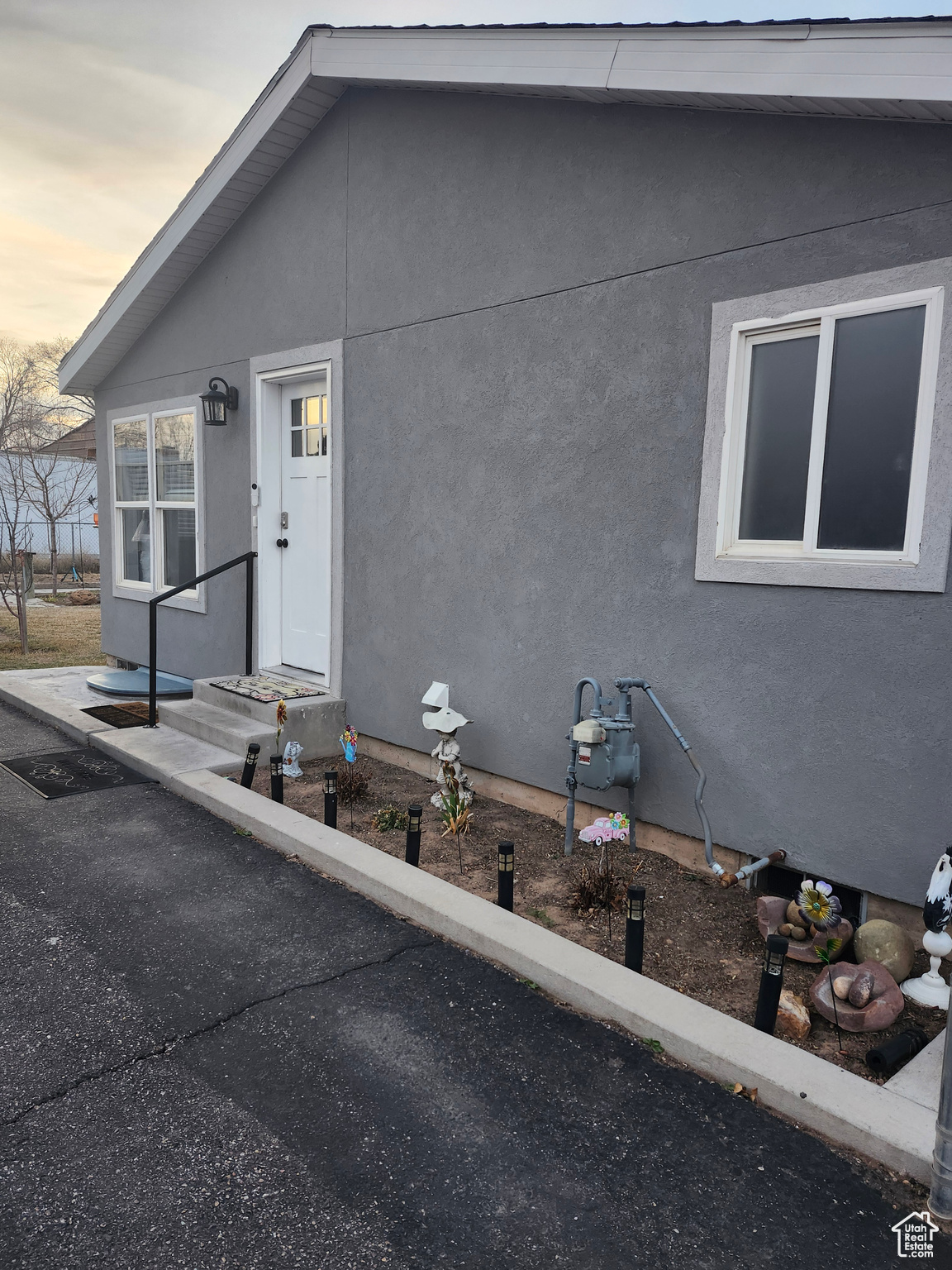 View of front of property with stucco siding