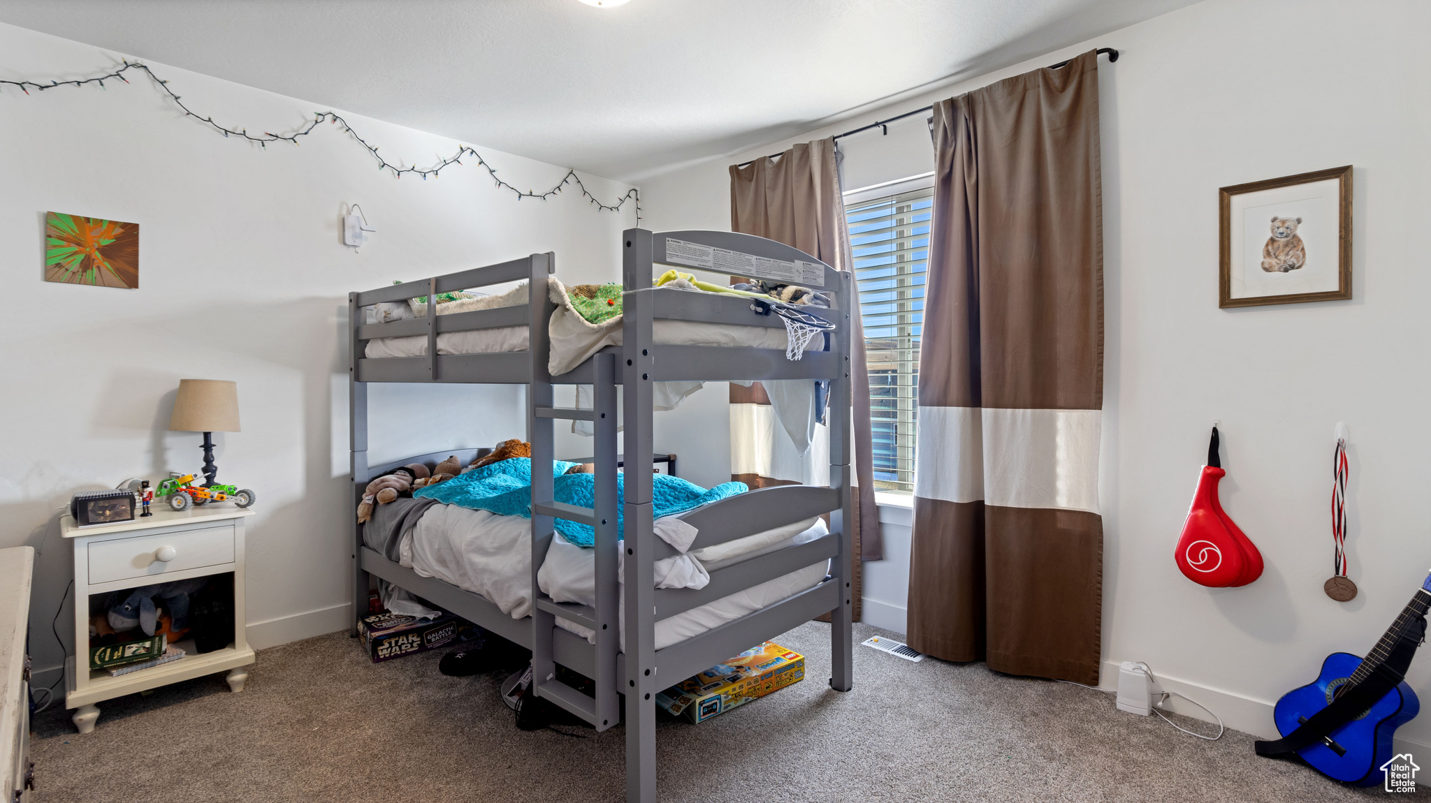 Carpeted bedroom with baseboards