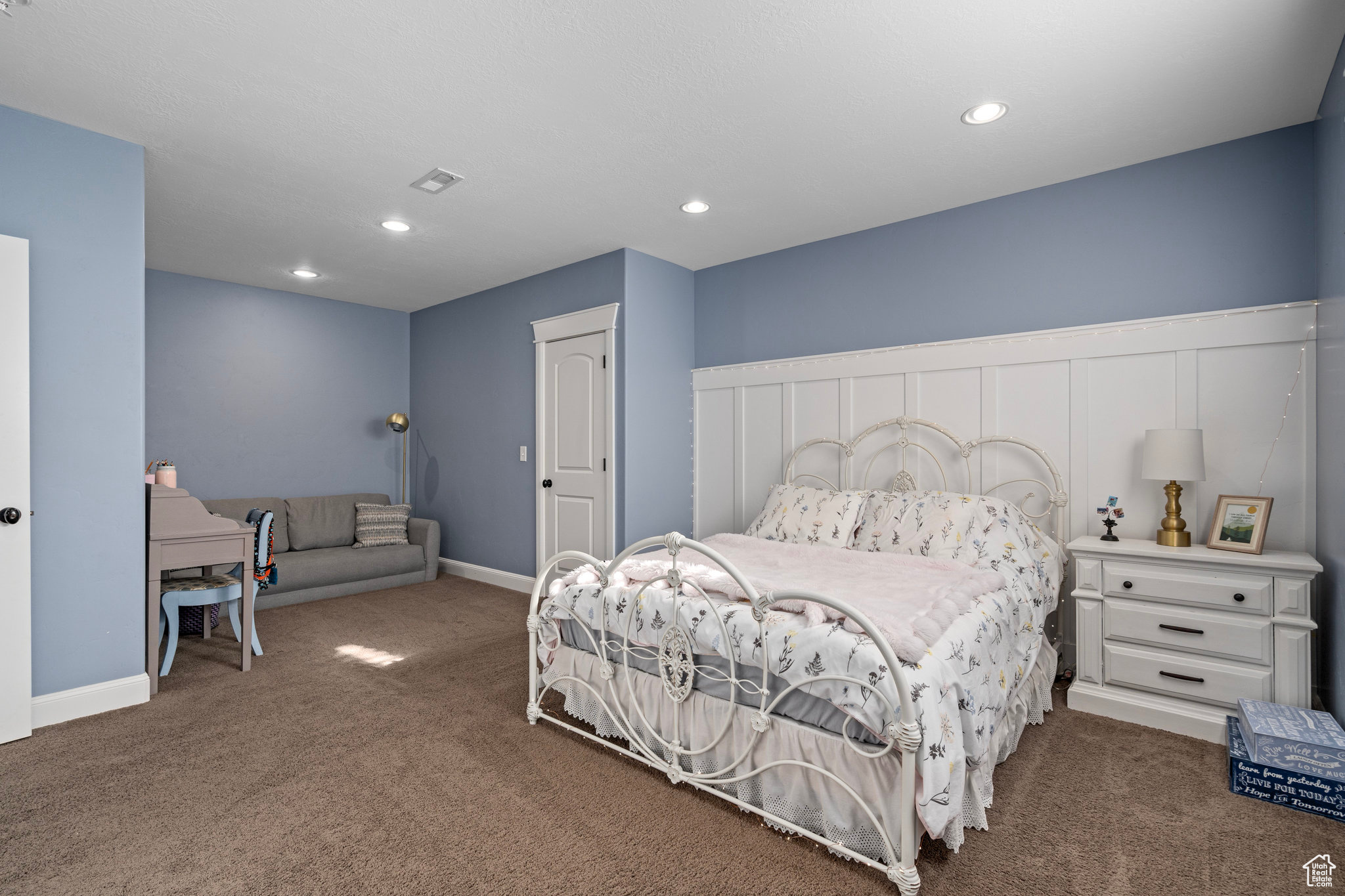Carpeted bedroom featuring recessed lighting, visible vents, and baseboards