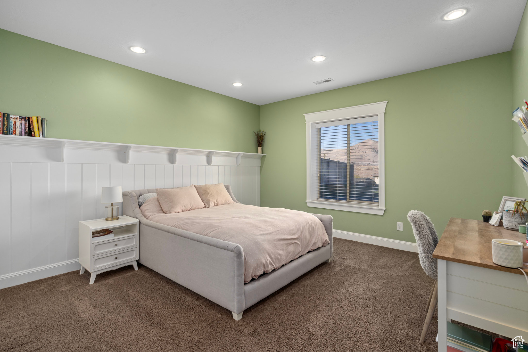 Carpeted bedroom with recessed lighting, visible vents, and baseboards
