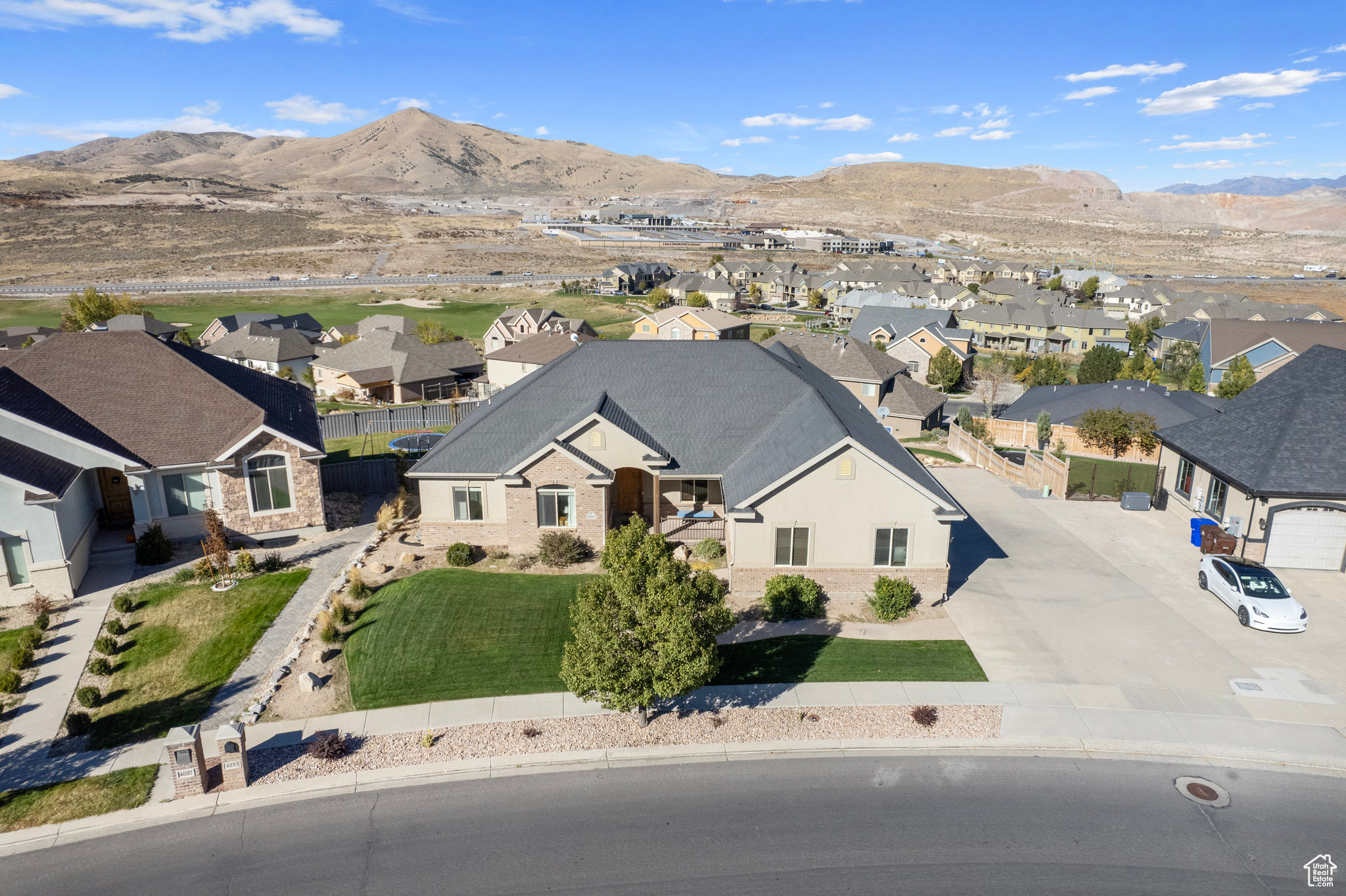 Drone / aerial view with a residential view and a mountain view