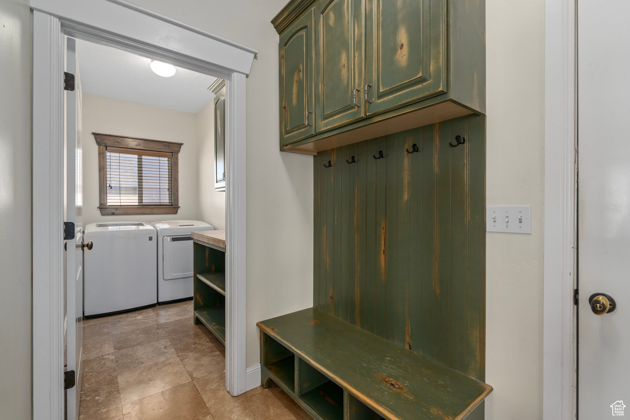 Mudroom with separate washer and dryer