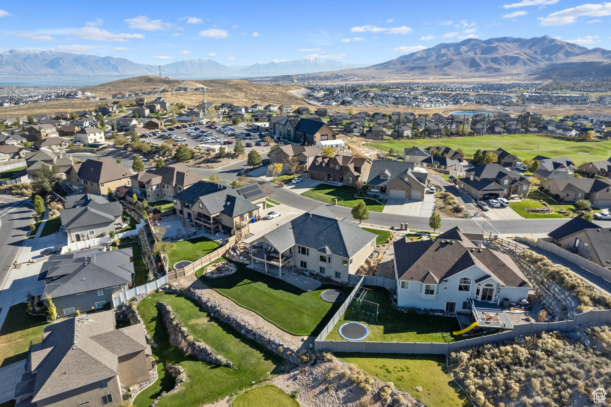 Birds eye view of property with a residential view and a mountain view