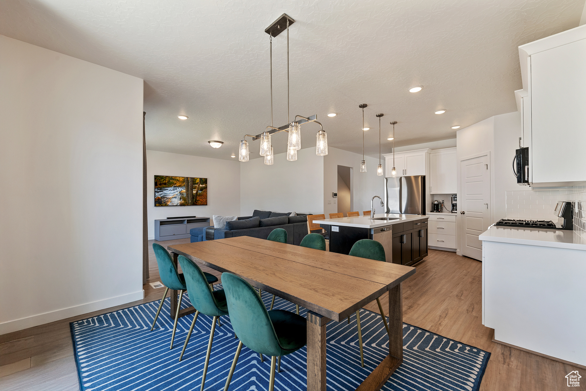 Dining space featuring recessed lighting, baseboards, and light wood-style flooring