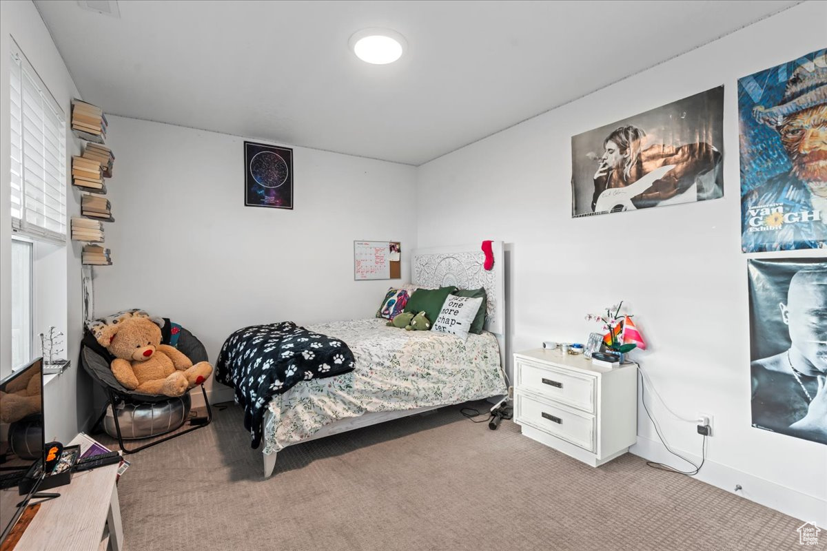 Bedroom with carpet flooring