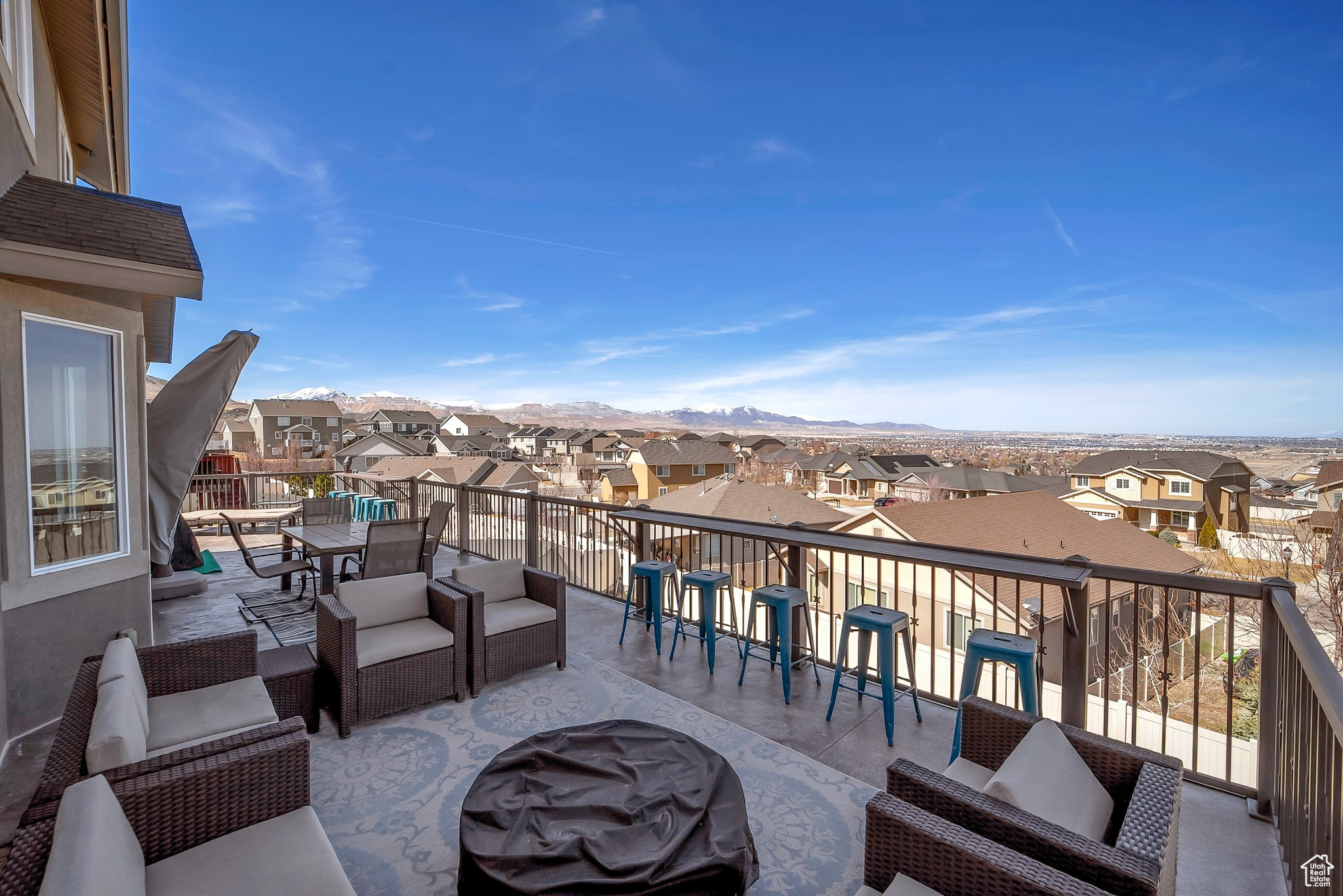 Balcony featuring a mountain view and a residential view