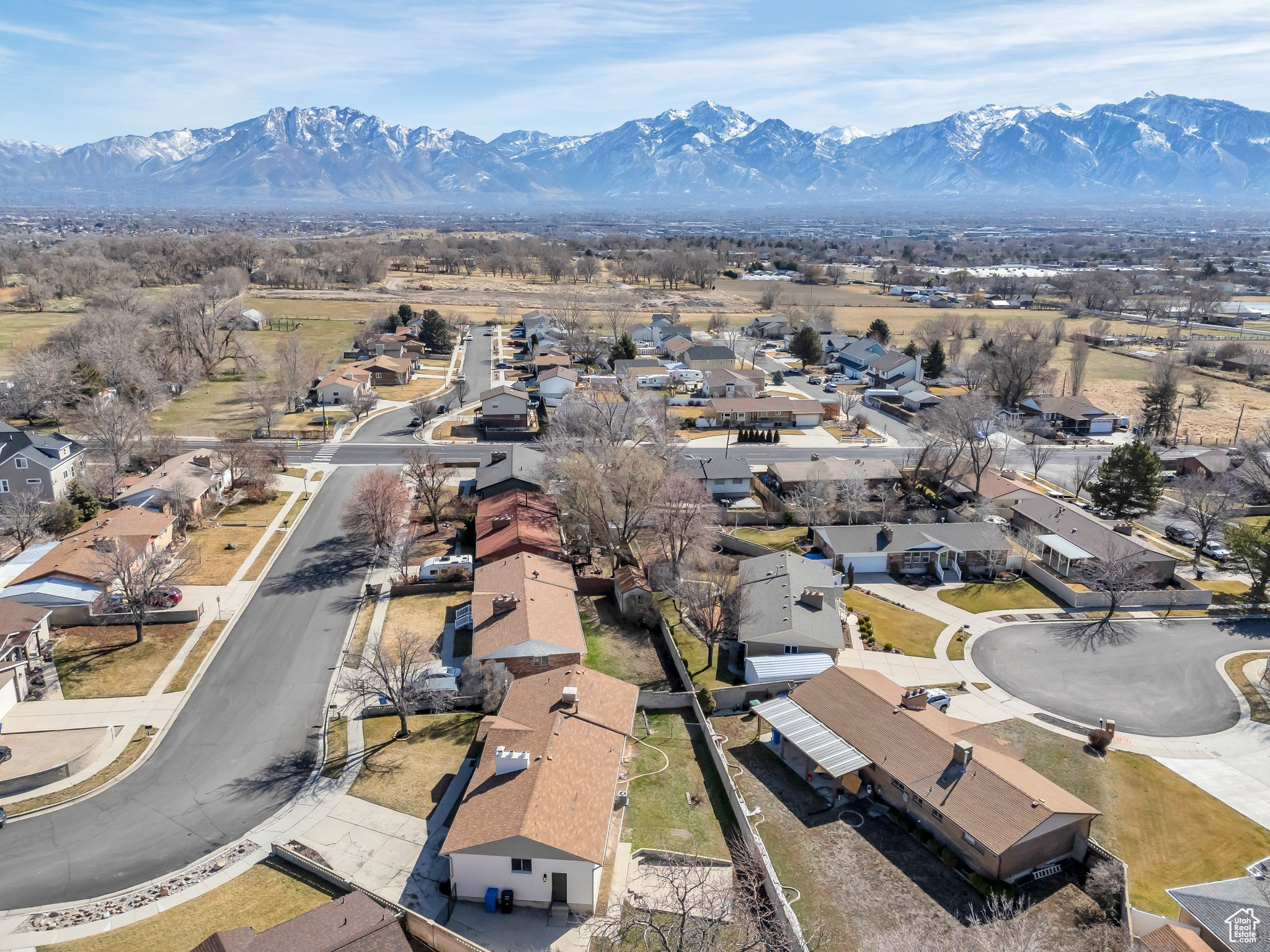 Birds eye view of property featuring a mountain view and a residential view