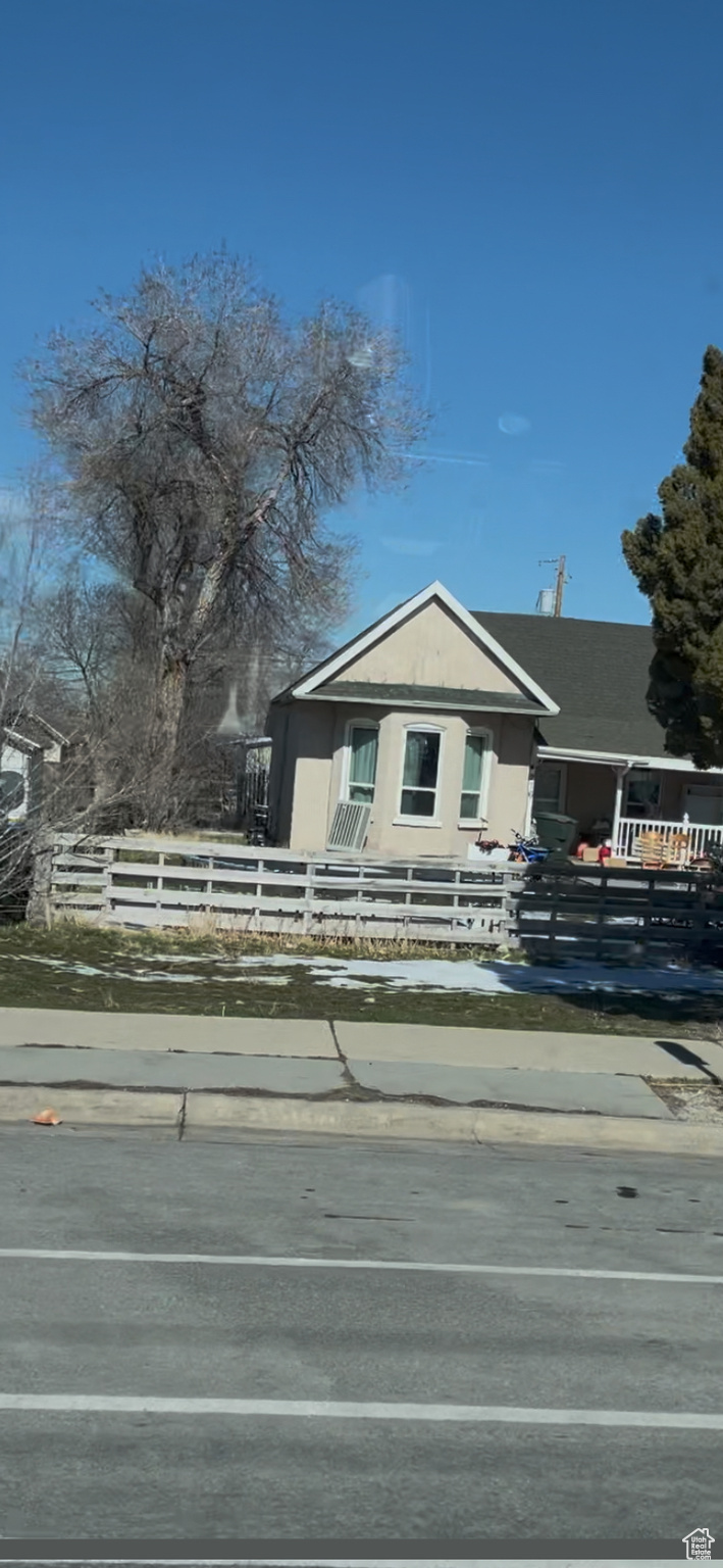 View of front of property featuring a fenced front yard