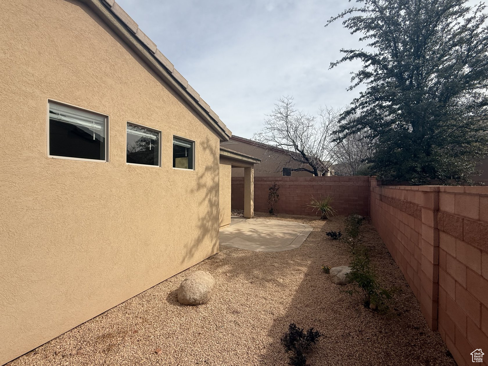 View of yard featuring a patio and a fenced backyard