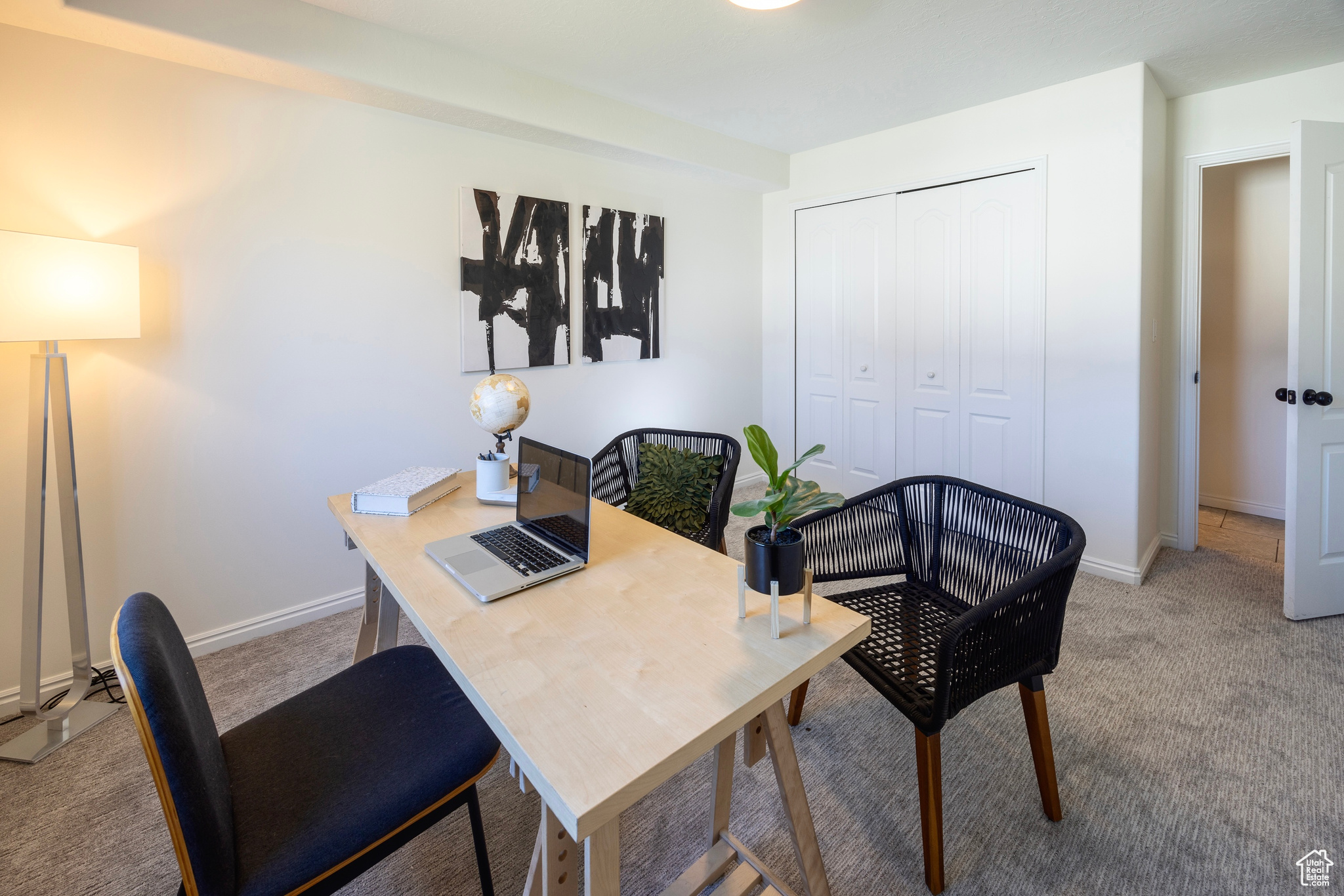 Office featuring carpet and baseboards
