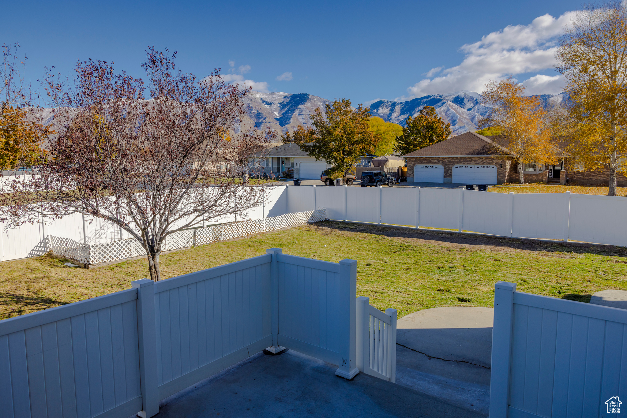 View of yard featuring a fenced backyard and a mountain view